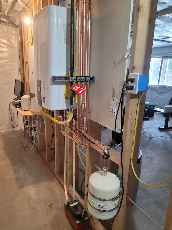 Licensed plumber repairing a kitchen sink in Marlin